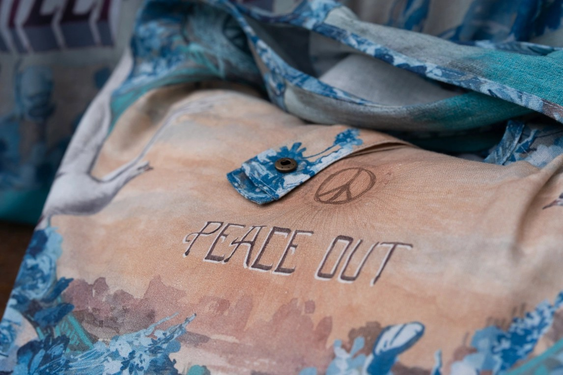 Peace Out Turquoise Linen Tote Bag with Doves and Sunrise
